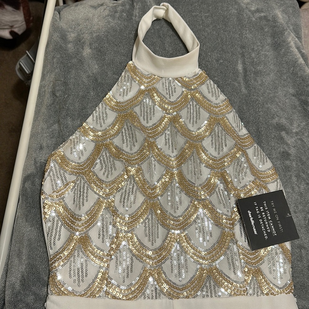 Charlotte Russe halter top white and gold jumpsuit size medium. Never worn.